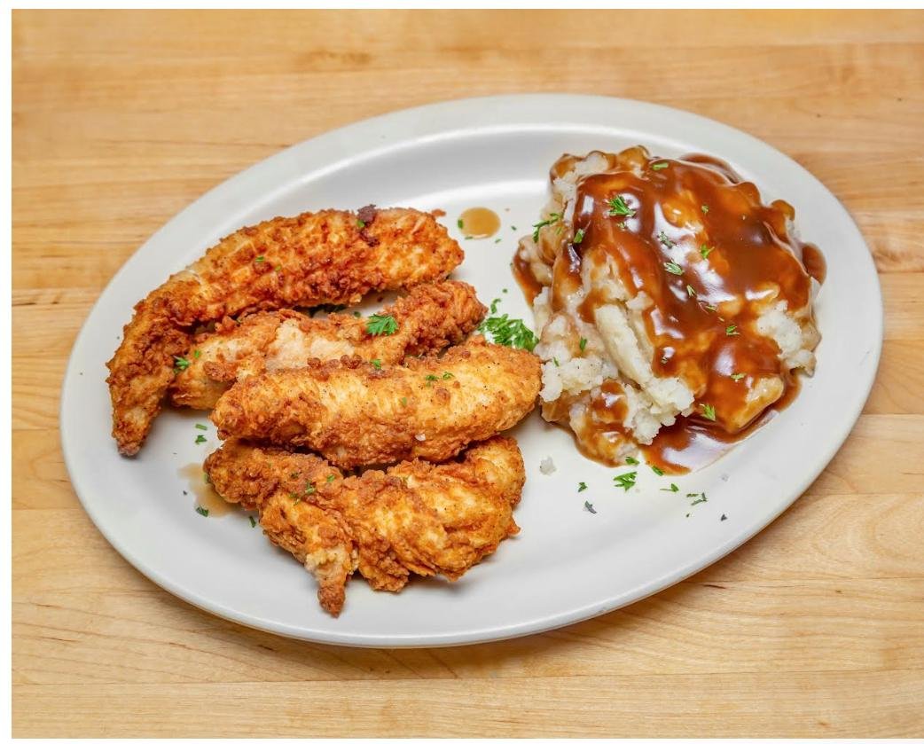 Fried chicken tenders with mashed potatoes and gravy